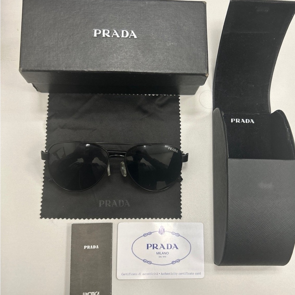 Like new Prada sunglasses. All included.